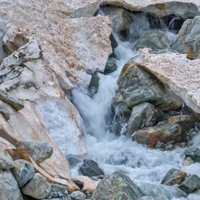 Freezing stream and stone